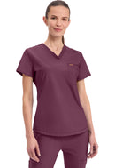 Cherokee Tuckable V-Neck Top. Item CK819 in CK FORM Collection. Live Chat for Bulk Discounts.