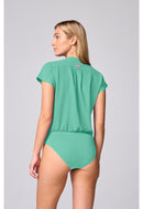 Med Couture One Pocket Bodysuit. Item MC00017 in MC AMP Collection. Live Chat for Bulk Discounts.